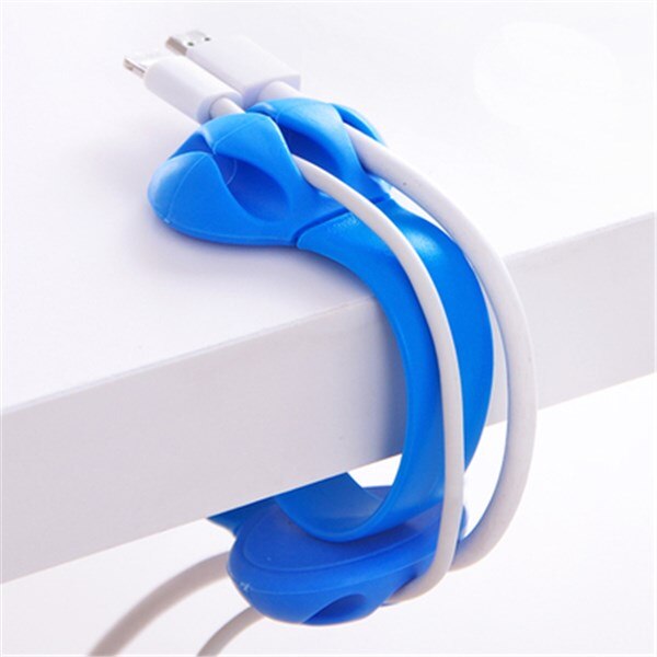 desk edge cable winder and hub clip used in a home office workspace