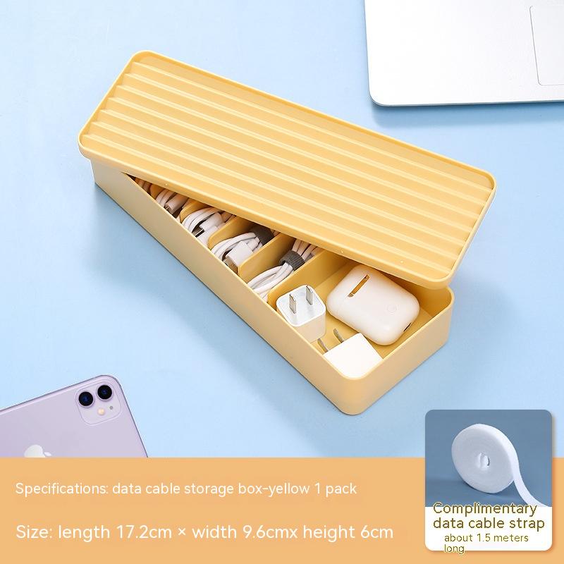 clear covered cable storage box for chargers used in a home office workspace