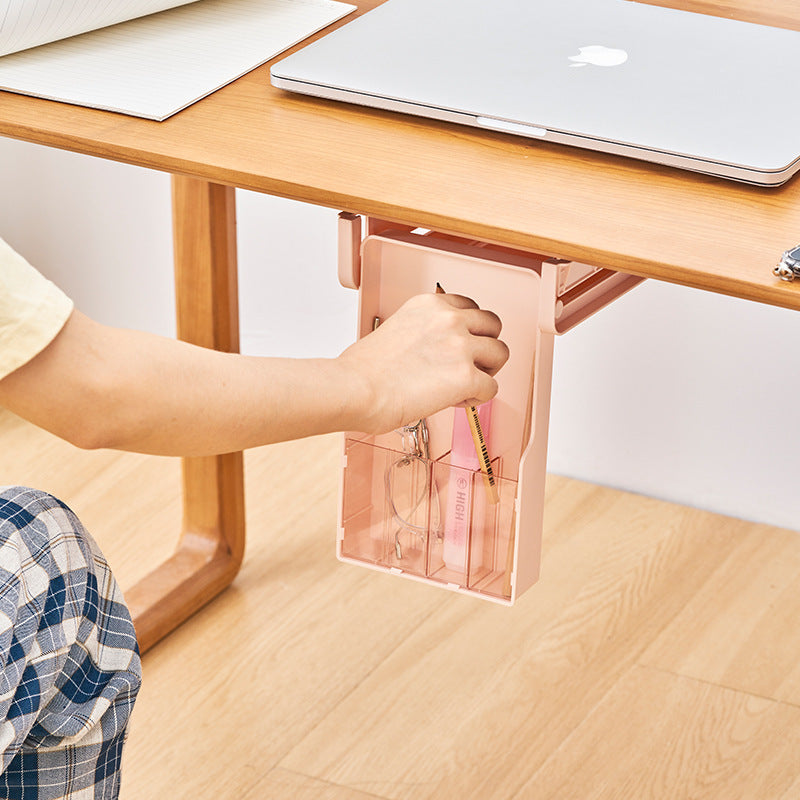 sliding under-desk storage drawer keeping a workspace organized