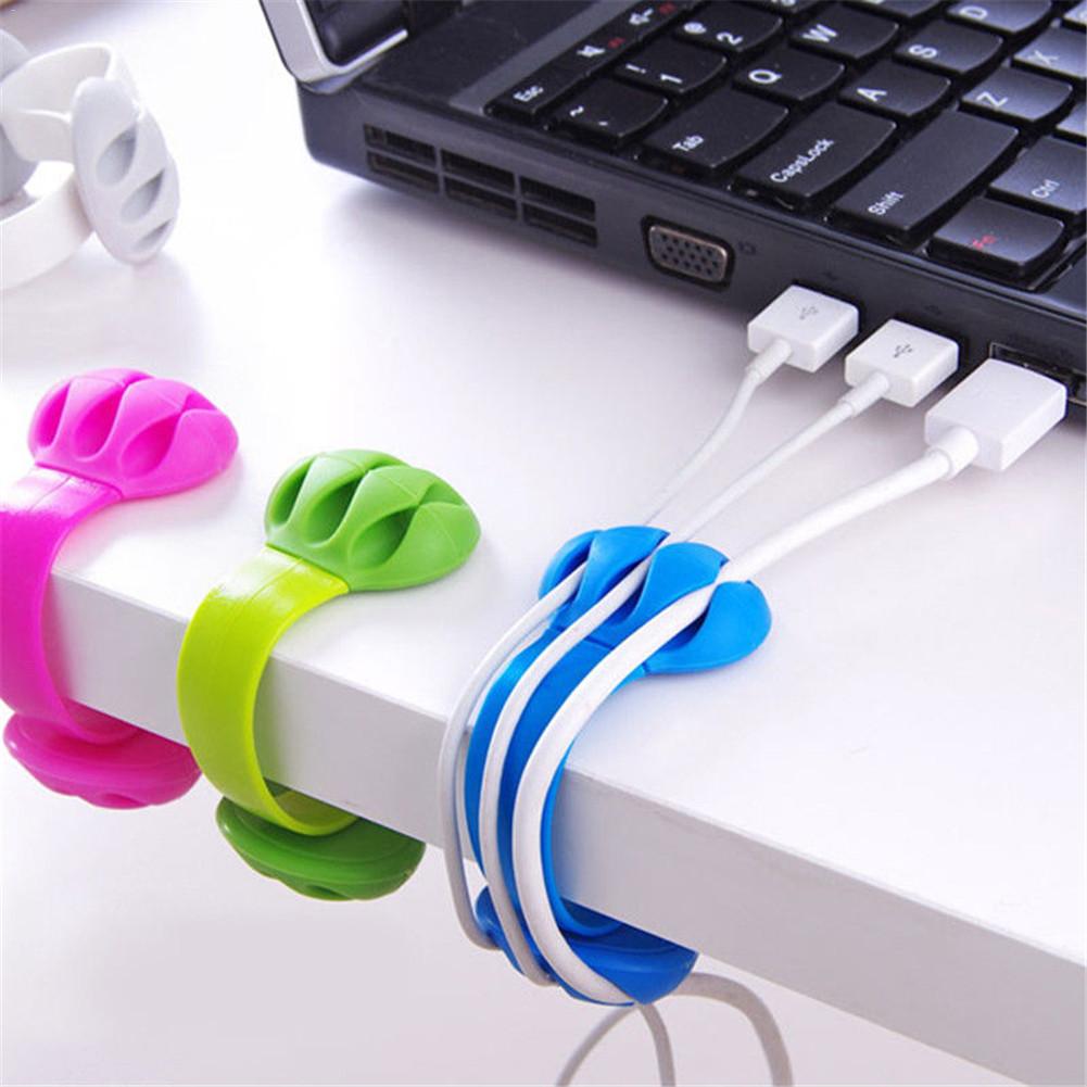 desk edge cable winder and hub clip keeping a workspace organized