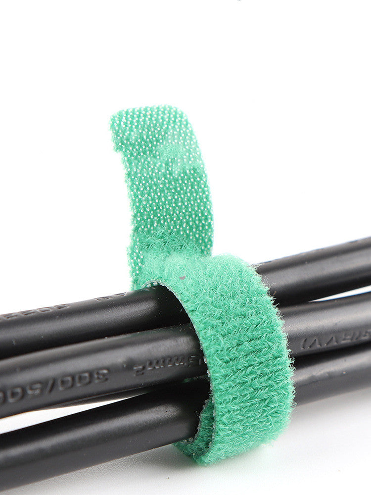 reusable velcro cable ties for desk management used in a home office workspace