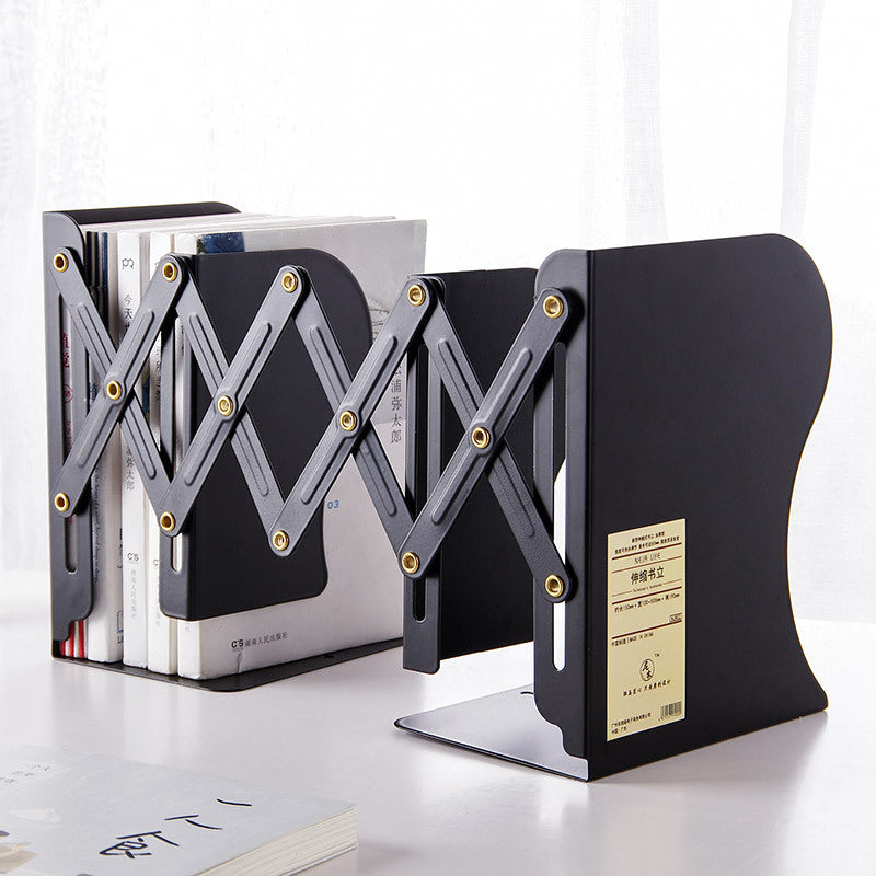 retractable metal desktop bookend organizer used in a home office workspace