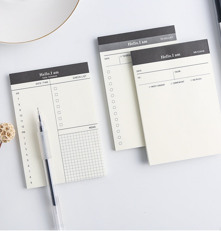 daily desk planner notepad for small desk setup on a clean desk setup