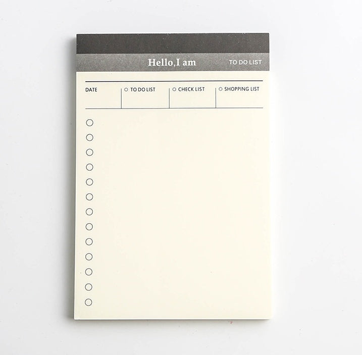 close up of daily desk planner notepad for small desk setup for small desk organization