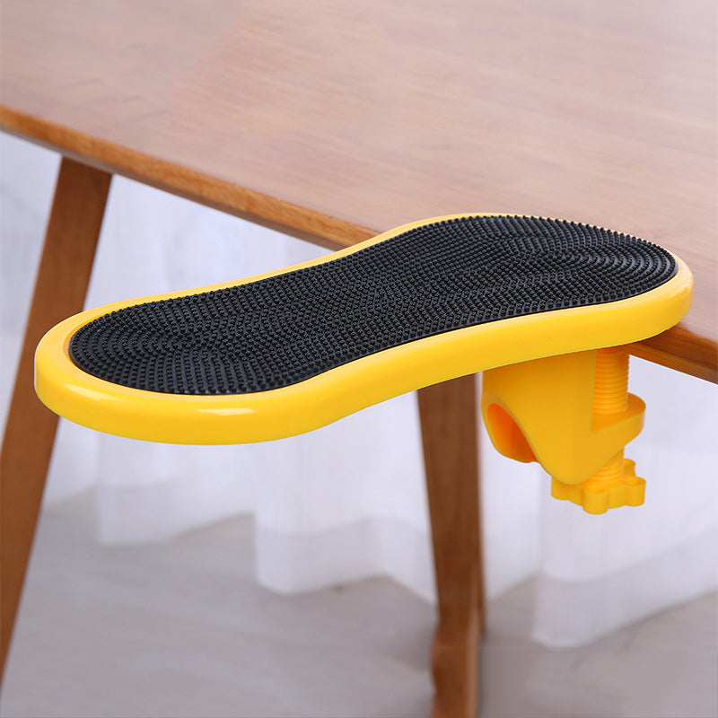 clamp-on desk arm rest extender for mouse support used in a home office workspace