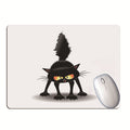 black cat desk mat for keyboard and mouse on a clean desk setup
