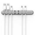 desk organizer organizing cables on a desk