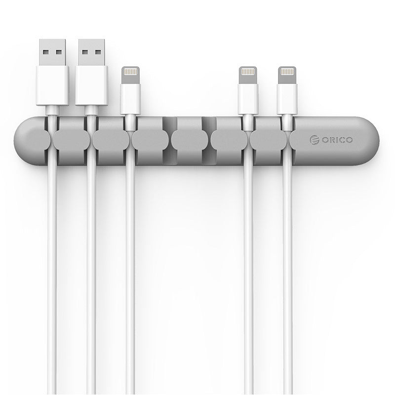 desk organizer organizing cables on a desk