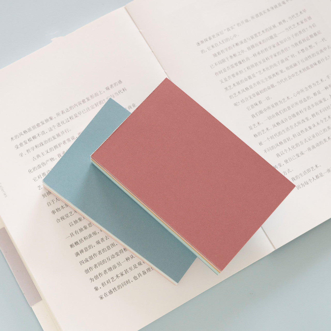 close up of warm color sticky memo notes for desk planning for small desk organization