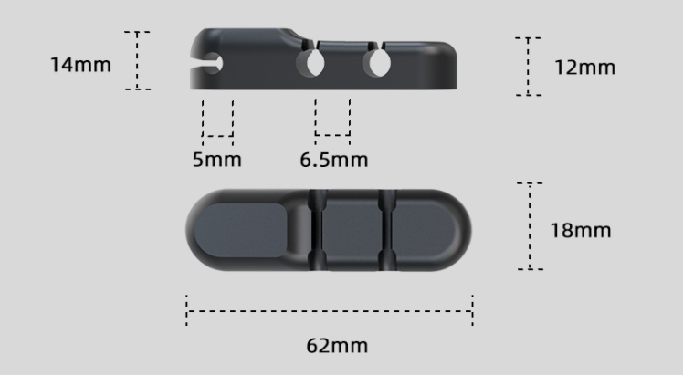 self-adhesive desktop cable organizer strip holding charging cords on a desk
