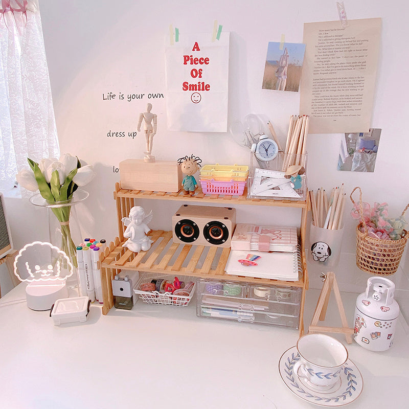 two-tier desktop shelf organizer for small desks used in a home office workspace
