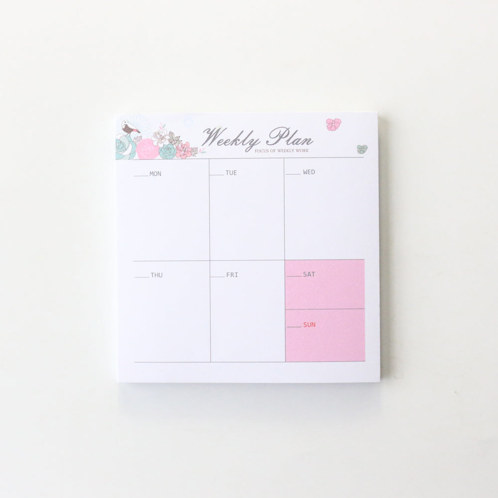 weekly desk planner pad for study  home office on a clean desk setup