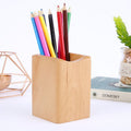 bamboo pen holder on an organized desk