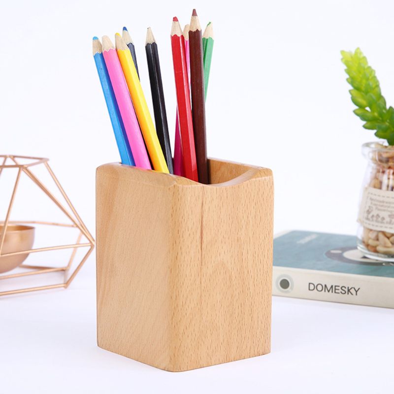 bamboo pen holder on an organized desk