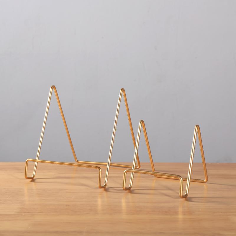 phone and tablet reading stand on a desk