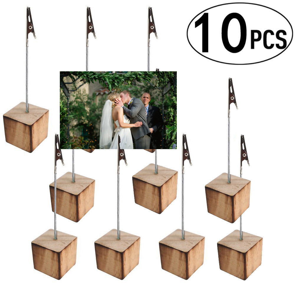 wooden photo and memo clip stands on a desk