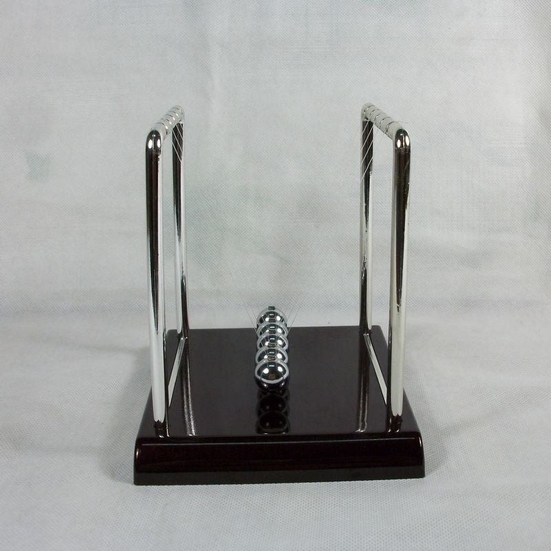newton ball desk toy for stress relief keeping a workspace organized