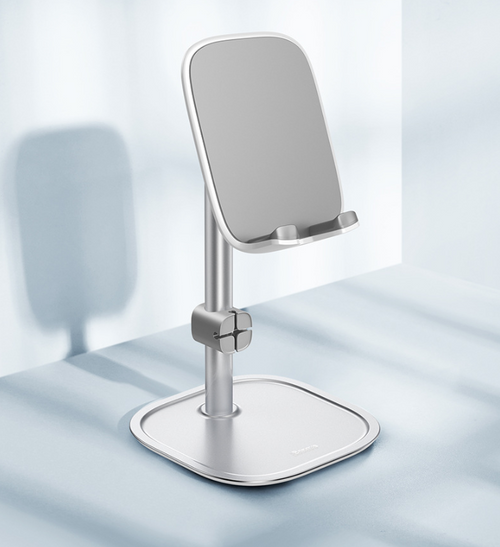 adjustable metal tablet stand for desk on a clean desk setup