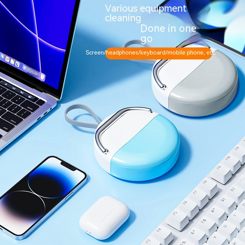 multifunctional keyboard cleaning brush set on a desk