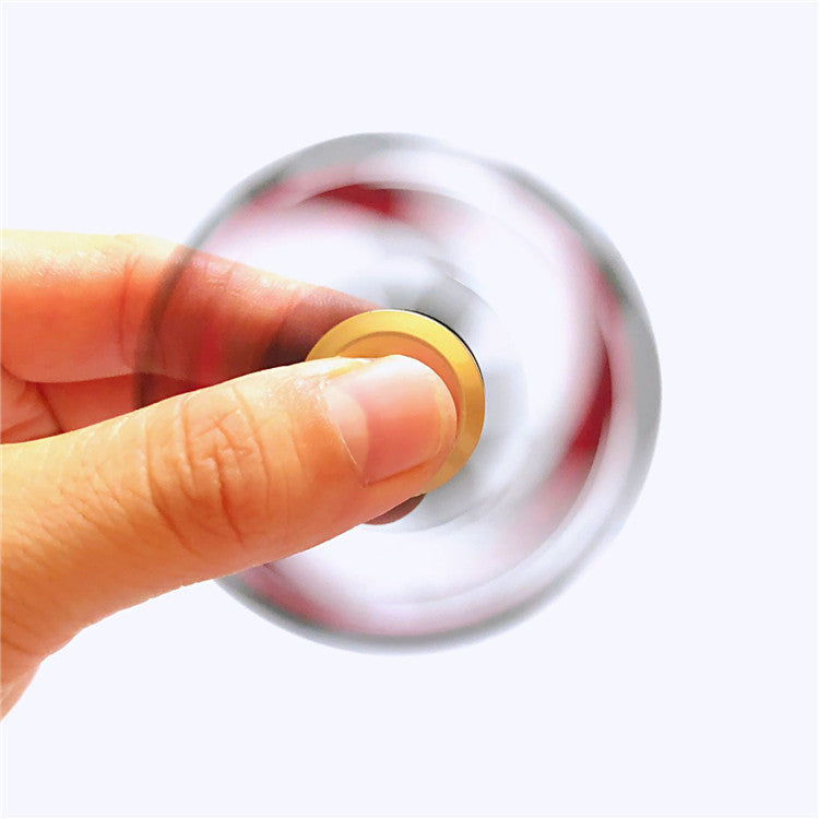 close up of metal spinning top desk fidget toy for small desk organization