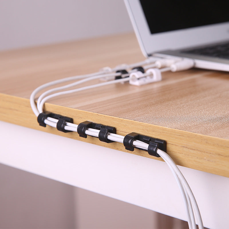 desktop cable clip organizer holding charging cords