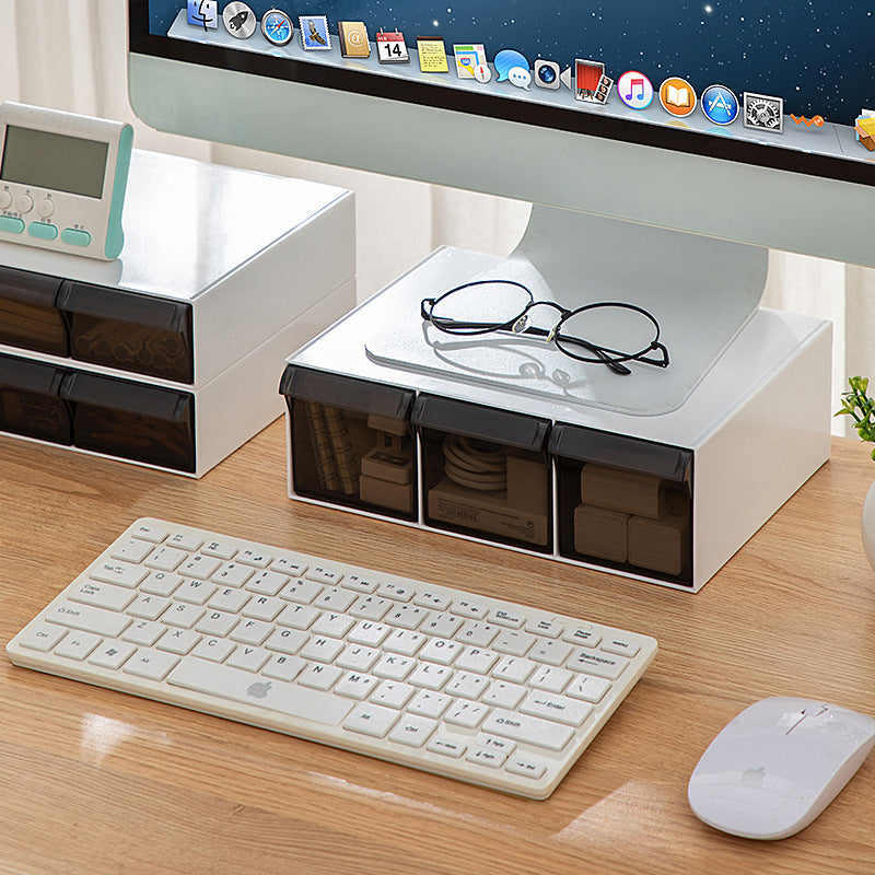 desk monitor riser storing small office supplies