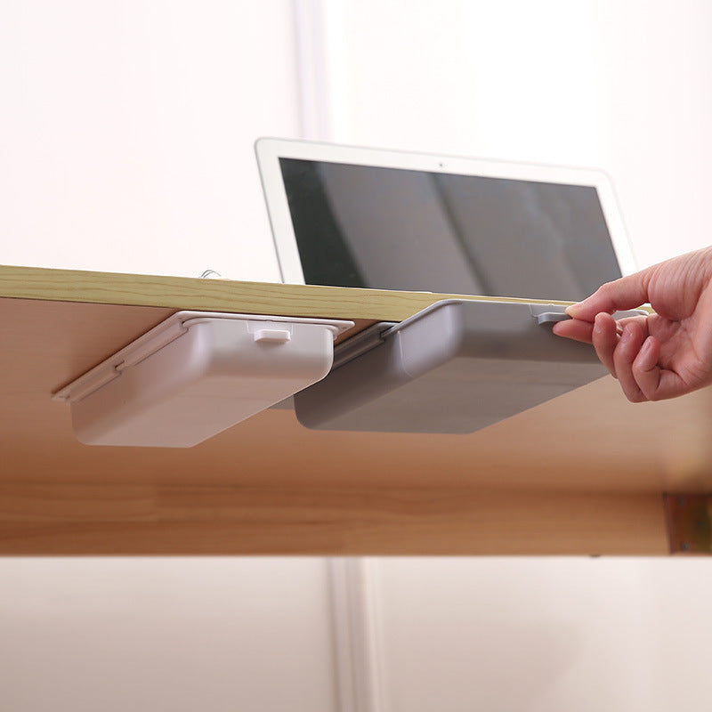 adhesive under-desk storage drawer for small supplies keeping a workspace organized