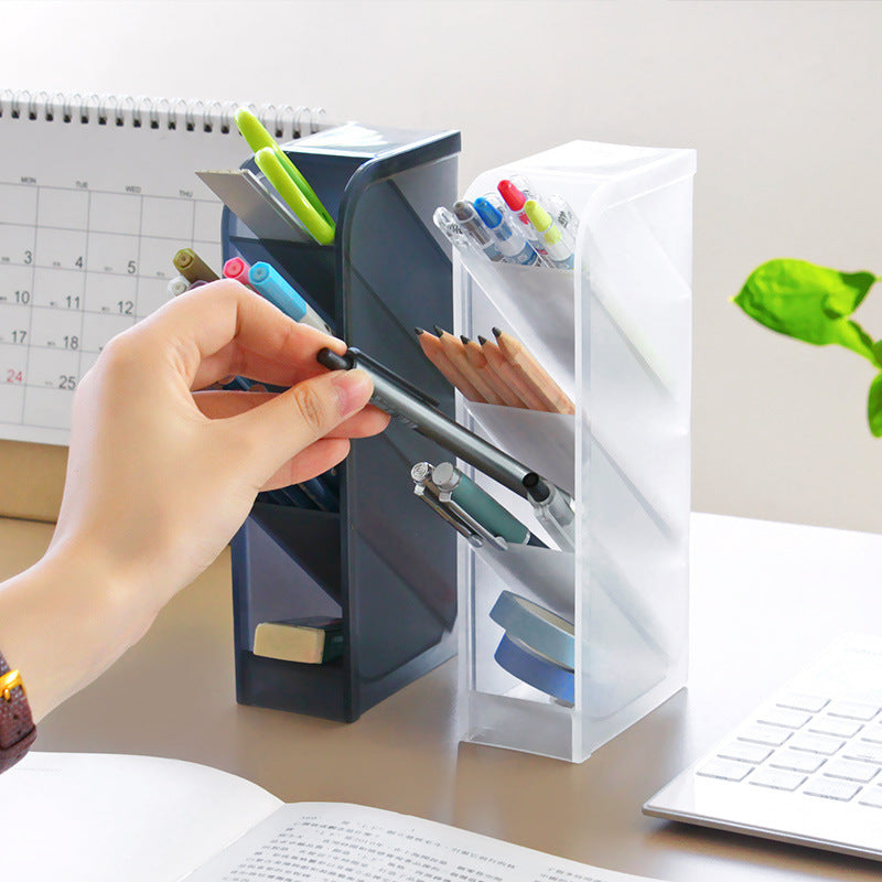 desk organizer holding pens and notebooks