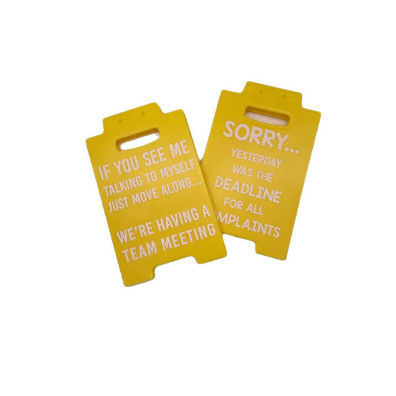 funny desk decor sign for work setups on a clean desk setup