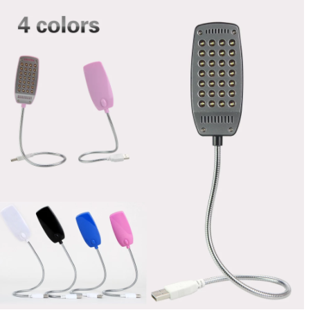USB desk light aimed at a keyboard