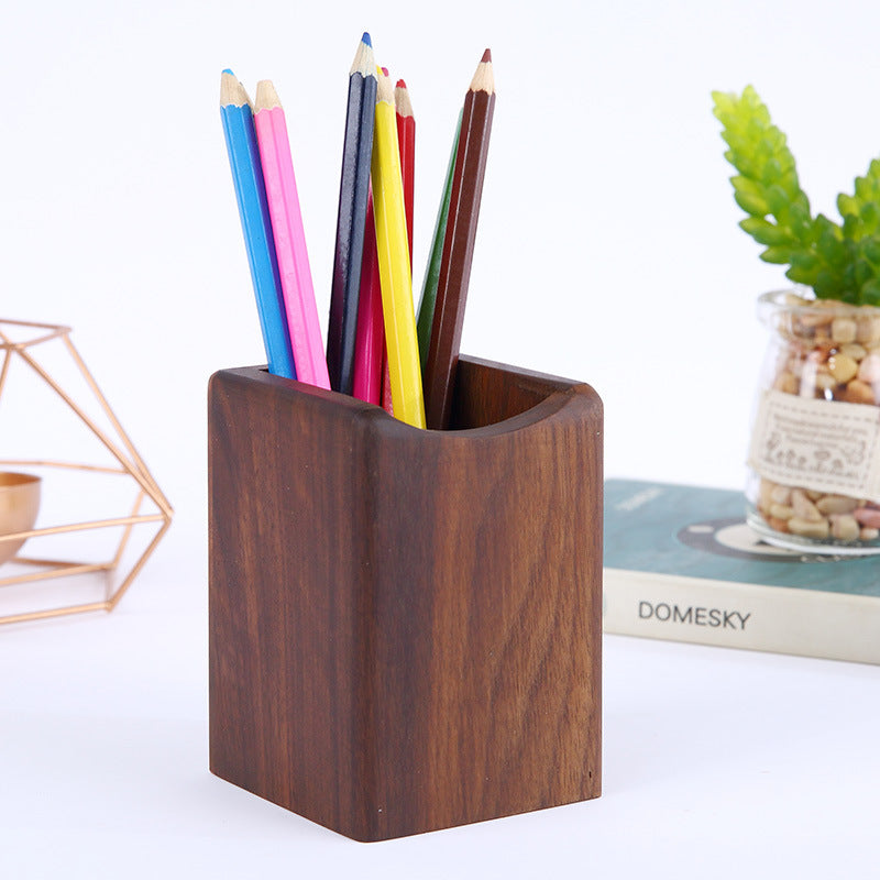 close up of wooden pen holder for desk organization for small desk organization