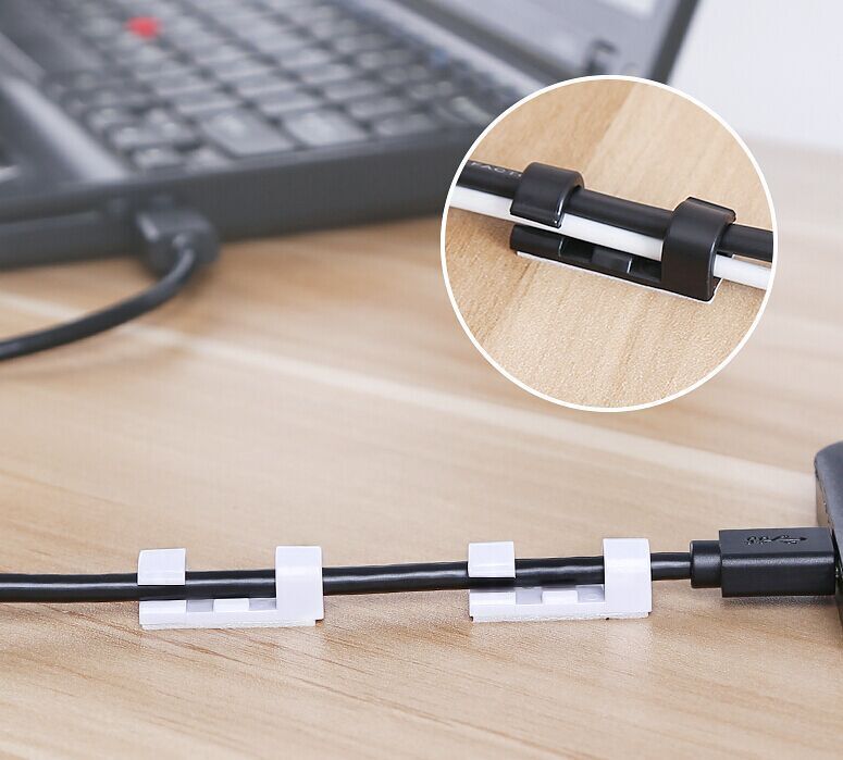 charging cable clips arranged on a clean desk