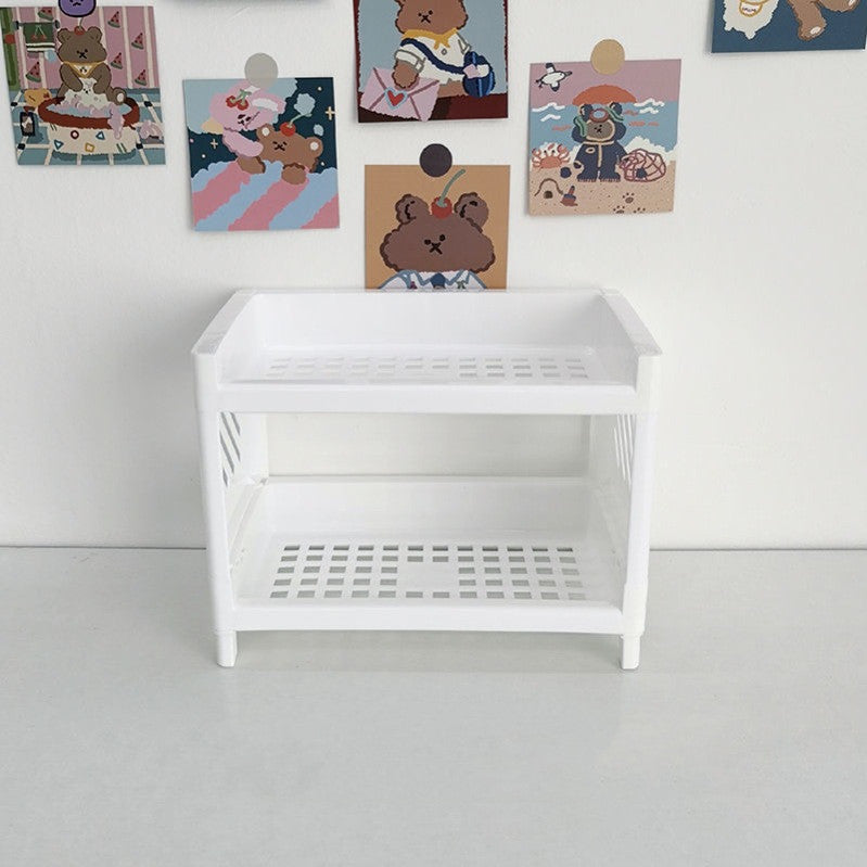 desktop shelf organizer for small desk storage used in a home office workspace