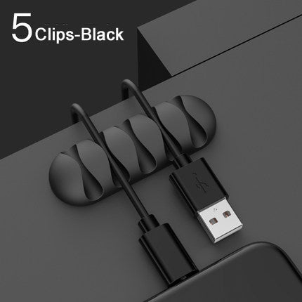 reusable silicone cable ties for desk cords used in a home office workspace