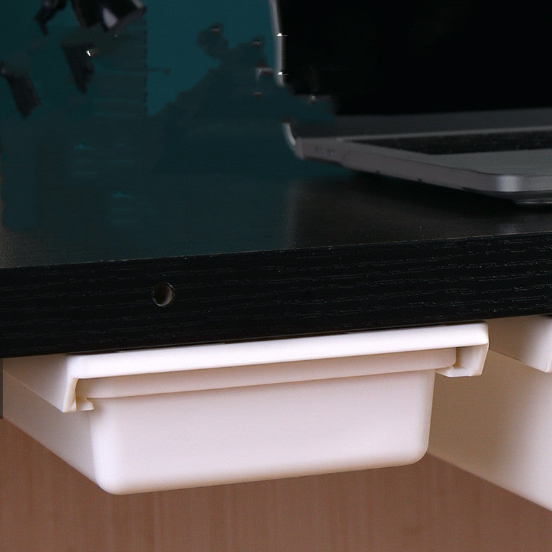close up of transparent under desk drawer organizer for small supplies for small desk organization