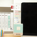 acrylic monitor memo board beside a screen