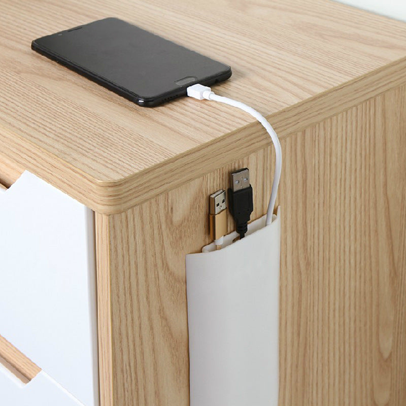 slim cable storage box for data cables keeping a workspace organized