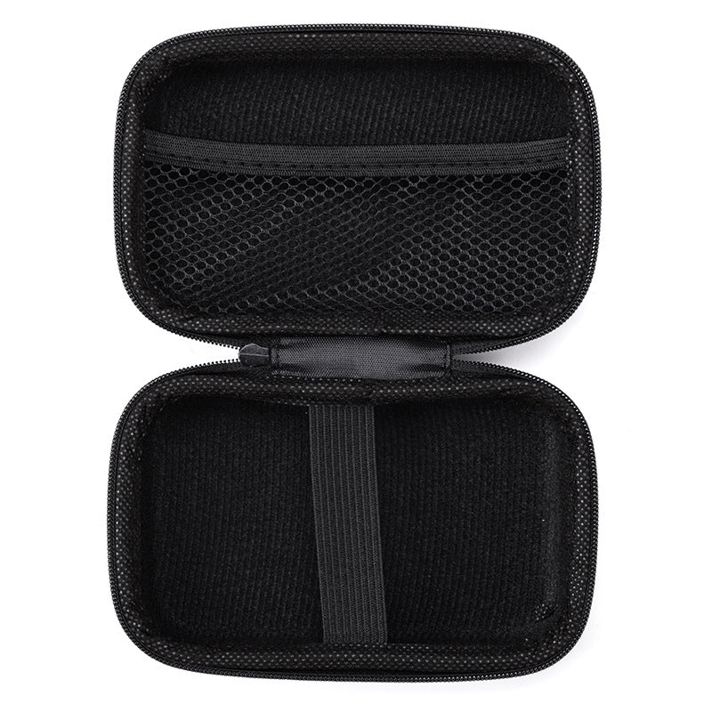 close up of hard shell cable organizer case for small tech for small desk organization