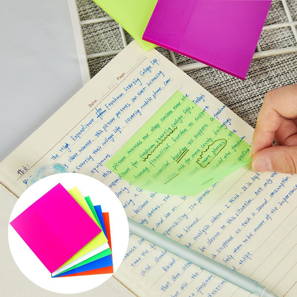 transparent sticky notes on a planner