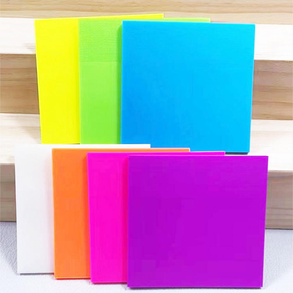 transparent sticky notes used on a book